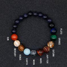 Here you have it...an astronomical bracelet that directly reflects the intertwined human nature and the universe. All the planets in our solar system are here- wrapped around your wrist. Great gifts for keen astronomers and stargazers. The various stones represent the solar system's planets, the universe and a black hole, which gives us the understanding that there is always a rebirth of new life and an ending to negative energies. This bracelet can help restore and balance your chakras - helpin Adjustable Celestial Beaded Bracelets As Gifts, Adjustable Celestial Bracelet Gift, Adjustable Celestial Bracelet For Gifts, Adjustable Celestial Style Bracelet Gift, Adjustable Celestial Bracelets As A Gift, Adjustable Celestial Bracelet With Round Beads, Adjustable Celestial Bracelets With Round Beads, Adjustable Celestial Beaded Bracelets With Round Beads, Celestial Style Adjustable Beaded Bracelets With Round Beads