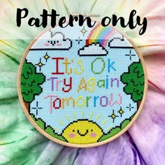 a cross stitch pattern with the words, i love you and rainbows on it