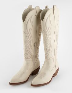 Mia Kolt Tall Western Boots. Take Your Boot Collection To New Heights With Kolt. Embroidered Details. Zip Closure On Sides. Approximate Shaft Height: 17.5". Approximate Heel Height: 2.5". Pointed Toe. Vegan Leather Upper. Synthetic Sole. Imported. Light Cowboy Boots Outfit, Cream Cowboy Boots Outfit, Cowboy Boots Outfit Winter, Tall Western Boots, Cowboy Boots Outfit, Tall Western Boot, Winter Boots Outfits, Boot Collection, Graphic Trends