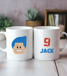 two coffee mugs with the faces of jack and jerry on them, sitting next to each other