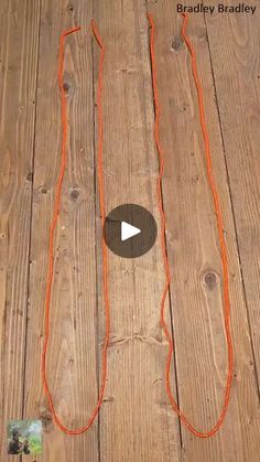 an orange rope is on top of a wooden floor with the words, how to make a