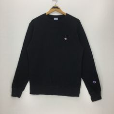 Vintage Champion crewneck sweatshirt in black colour. Still in good condition. SEE THE PICTURES FOR MORE DETAILS. CONDITION : 9/10 MEASUREMENT Pit : 20.5 inch Length : 27.5 inch Shoulder : 5.5 inch Arm Length : 25 inch Size On Tag : L PAYMENT We accept PayPal only. The item will be ship 3-5 days once the payment has been made. SHIPPING DHL ONLY. USUALLY AROUND 7-21 DAYS BEFORE REACH THE DESTINATION. *NOTES TO BUYERS* Most of the items in our store are USED ITEMS/VINTAGE. So PLEASE CHECK ALL THE Vintage Black Sweatshirt For Winter, Classic Crew Neck Sweats For Streetwear, Basic Black Crew Neck Sweatshirt, Basic Black Crew Neck Sweater, Black Crew Neck Basic Sweater, Black Classic Long Sleeve Sweatshirt, Classic Black Long Sleeve Sweatshirt, Vintage Black Sweatshirt With Ribbed Cuffs, Basic Black Crew Sweatshirt