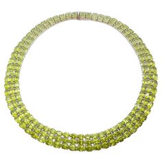 Peridot 175.10 carats Necklace set in Silver Settings Width: 1.6 cm Length: 46.0 cm Total Weight: 103.98 grams *Please note that the silver setting is plated with gold to promote shine and help prevent oxidation. However, with the nature of silver, oxidation may occur over time and use. "We first opened doors in 1980 when it was then situated in the vicinity of the Victory Monument; a small and modest storefront with a couple of counters. From its humble beginnings to where it stands today, our Luxury Gold Tsavorite Necklaces, Luxury Multi-stone Classic Necklaces, Green Hallmarked Diamond Necklace Fine Jewelry, Green Hallmarked Diamond Necklace, Luxury Peridot Jewelry For Formal Occasions, Luxury Hallmarked Peridot Jewelry, Formal Lime Green Peridot Jewelry, Formal Peridot Gemstone Necklaces, Humble Beginnings