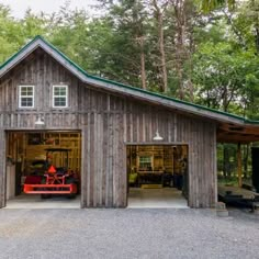 a car is parked in front of a garage