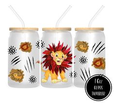 three glass tumblers with lion images on them