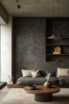 a living room filled with lots of furniture and decor on top of a wooden floor