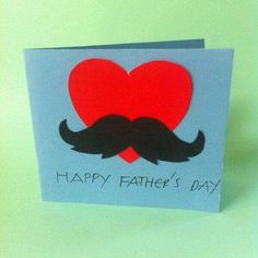 a father's day card with a mustache and heart cut out in the middle