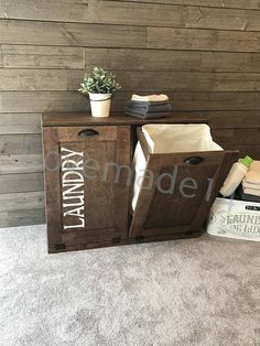 a wooden cabinet with two doors and some towels