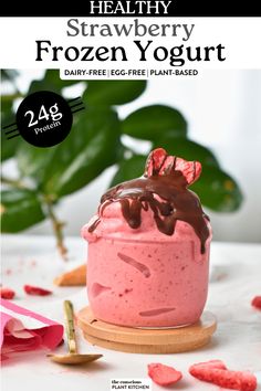 the cover of healthy strawberry frozen yogurt with chocolate drizzle on top