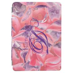 an ipad case with pink and purple flowers