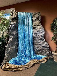 a fake waterfall in the middle of a room