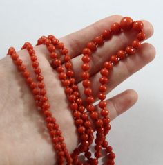 -Antique 10k Gold Natural Orange Red Coral Coral Beaded Necklace -Total length: 32.25 in -Bead size: 3.8 mm ~ 8.9 mm -Total weight: 22.6 g -Marked 10k Vintage Red 8mm Beaded Jewelry, Vintage Red Jewelry With 8mm Beads, Classic Red Single Strand Beaded Necklace, Classic Red Beaded Jewelry, Classic Red Hand-strung Necklaces, Classic Red Jewelry With Round Beads, Classic Red Hand-strung Jewelry, Coral Beads Necklace, Coral Earrings