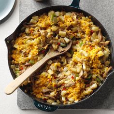 a skillet filled with food on top of a table