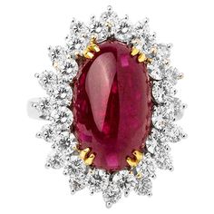 This is definitely one of nature's rarest beauties, Burmese Ruby. This one of a kind piece has 9.05 Carats of Cabochon Cut Burmese Ruby surrounded with 2.02 Carats of Diamonds. Stone : 9.05 Ct's Burmese Ruby Diamonds : 2.02 Ct's G VVS Gold : 18K Jewelry Knowledge, Burmese Ruby, Slim Aarons, Golden Ring, Diamond Hoop Earrings, Ruby Diamond, Diamond Solitaire Rings, Burmese, Gold Jewelry Fashion