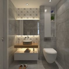 a bathroom with a toilet, sink and mirror