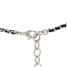 This is an authentic CHANEL Metal Lambskin CC Crystal Locket Necklace in Black. This stunning silver-tone chain necklace features a round locket pendant with a Chanel CC logo and a black leather threaded chain. Crystal Locket, Thread Chains, Chanel Necklace, Round Locket, Leather Thread, Chanel Jewelry, Necklace Black, Cc Logo, Locket Necklace