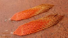 These unique handmade earrings are made of high-quality Czech beads and strong synthetic thread. They are elegant, fashionable, and highly versatile, suitable for everyday wear. Color: orange, gold, bronze . There may be some color discrepancies which is due to the different monitor settings I will make these earrings for you in your favorite size. 100% hand made with love! Measurements: Length-about 11cm (4.3 inch) Width -about 2 cm (0.79 inch) Materials: Sterling silver components Czech glass Orange Beaded Earrings With Gold Round Beads, Orange Earrings With Tiny Round Beads, Orange Handwoven Beaded Earrings, Red Chandelier, Peacock Feather Earrings, Unique Handmade Earrings, Hippie Earrings, Bird Earrings, Earring Cards