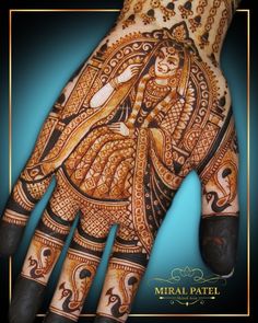 an intricate hendi design on the palm of someone's hand