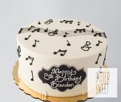 a birthday cake with musical notes on it