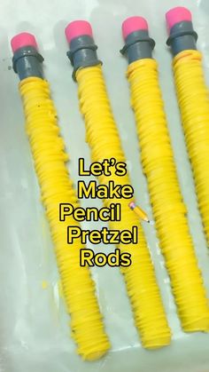 there are four yellow and black plastic rods in the box with words let's make pencil pretzel rods