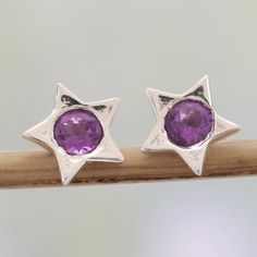 Chintan of India presents lovely stud earrings to add charm and sparkle to any style. Handcrafted of sterling silver, each star-shaped earring is centered with a sparkling amethyst. Amethyst Studs, Bright Star, Purple Pearl, Amethyst Color, Star Earrings Stud, Sterling Silver Stud Earrings, Silver Stud Earrings, Amethyst Earrings, Bright Stars