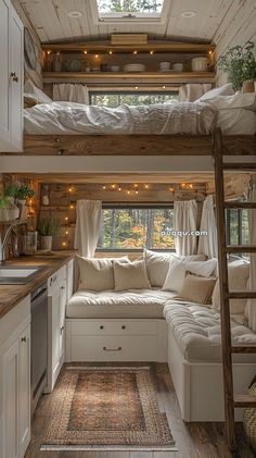 a loft bed is built into the side of a small house with lights strung from the ceiling