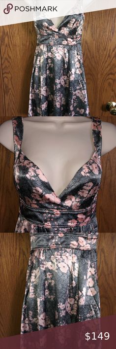 GUESS By Marciano Silk Dress Lined Floral Print XS Beautiful dress from Guess by Marciano. New with tags. It is a floral design in light and dark gray with peach or pink flowers. The material is 96% silk and 4% spandex. Lining is 100% polyester. Sleeveless. Has two pockets. Zips in the back with hook and eye closure. Length is mini or short. Size is an extra small, most likely a Juniors. 14” across at the under arms lying flat. 12" at waist. 32” from shoulder seam to bottom Hem. Questions always Pink V-neck Maxi Dress For Cocktail, Formal Lined Pink Mini Dress, Pink Lined Mini Dress For Formal Occasions, Pink V-neck Maxi Cocktail Dress, Formal Pink Lined Mini Dress, Evening Floral Print V-neck Mini Dress, Pink Fitted A-line Maxi Dress, Fitted Pink A-line Maxi Dress, Pink Lined V-neck Maxi Dress