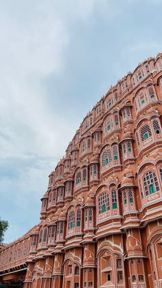 an ornate building with many windows and balconies