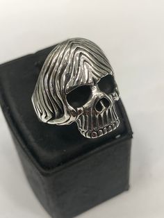 It is a carefully crafted product made of 925 sterling silver. Gothic Silver Skull Ring, Silver Engraved Skull Ring, Gothic Silver Ring With Skull Print, Sterling Silver Skull Ring In White Gold, Gothic Skull Ring Stamped 925, Sterling Silver Skull Ring With Engraving, Gothic Sterling Silver Rings With Skull Print, Sterling Silver Skull Ring Engraved, Sterling Silver Engraved Skull Ring