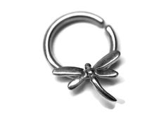 a silver nose ring with two leaves on it