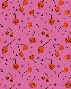 a pink background with red and black jack o lantern faces