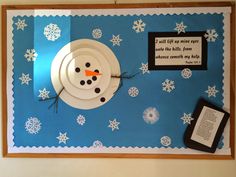 a bulletin board with a snowman on it