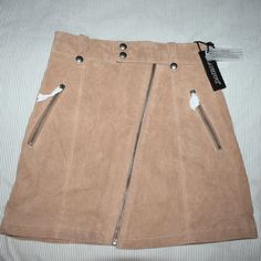 Nwt New With Tags Blanknyc Suede Zipper Mini Skirt Size 25. Taupe, Coffee Bean Color. Cute For Fall! Love This Color, The Inside Is Fully Lined With A Polyester Lining. Zipper Comes Down All The Way. Tags: Leather, Suede, Fall Skirt, Date Night, Mini Skirt, Fall Style, Revolve, Nordstrom, Everyday, Coated Denim Jeans, Fall Skirt, Fall Love, Vegan Leather Skirt, Zipper Skirt, Faux Leather Mini Skirt, Jean Mini Skirts, Suede Mini Skirt, Suede Skirt