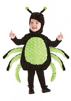 a little boy in a costume that looks like a spider