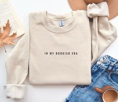 Embrace your love for reading with our "In My Bookish Era" sweatshirt. Perfect for book lovers, avid readers, and bookworms, this cozy and stylish sweatshirt is an ideal gift. Whether you're curling up with a good book or heading out, this sweatshirt celebrates your passion for stories and literature. A thoughtful gift for any reading enthusiast, it's sure to become a favorite in any book lover's wardrobe. Personalization- * Text colors are available in navy blue, brown, black, white, and white Cute Christian Gifts, Christian Merchandise, Freezer Paper Stenciling, Sweater Embroidery, Embroidered Products, Mom Apparel, Christian Merch, Gifts For Hubby, About Heart