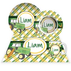 a green and yellow plaid tableware set with the name llam on it