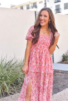 The secret to happiness starts with this floral maxi dress that will make you feel beautiful on your next vacation! This dress is also perfect for a bridal shower, baby shower or spring family photos! Fabricated in a gorgeous smocked fit and complete with the slit down the right. Floral midi/maxi dress Slit on Right leg Smocked upper bodice Tiered skirt detailing Lined on upper bodice and skirt, lower skirt is sheer Puff sleeves Runs true to size Piper is 5'3, wears a size 0-2 and is wearing a S Spring Family Photos, Secret To Happiness, Spring Family, Feel Beautiful, Smocked Dress, Shower Baby, Midi Maxi Dress, Tier Skirt, Tiered Skirt