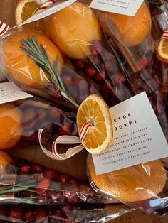 oranges wrapped in cellophane and labeled with stop pourri's on them