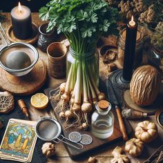 a table topped with lots of different types of food and candles on top of it