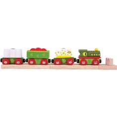 a wooden toy train with green and red cars