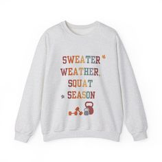 Our Fit Girl sweatshirt is designed for fierce women balancing fitness goals with everyday life. Whether you're a powerhouse mom juggling motherhood and muscle, or a fitness queen smashing your workouts, this cozy sweatshirt is for you! Crafted with soft, high-quality fabric, this cozy sweatshirt is perfect for gym days, running errands, or relaxing. With a relaxed fit and available in multiple colors, these sweatshirts are the perfect addition to your wardrobe or a thoughtful gift for a fellow fit and loved woman in your life! Why You'll Love It: -Super Soft Fabric: Crafted from a warm and comfy blend of 50% cotton and 50% polyester, this sweatshirt feels like a cozy hug, perfect for those colder days. -Built to Last: With double-needle stitching on the shoulders, armholes, neck, waistban Athletic Heather Crew Neck Sweats For Winter, Winter Athletic Heather Top With Graphic Print, Winter Athletic Heather Crew Neck Sweats, Winter Crew Neck Sweats In Athletic Heather, White Crew Neck Activewear For Winter, Fall Gym White Sweatshirt, White Sweatshirt For Gym, Fall Season, White Sweatshirt For Gym In Fall, White Gym Sweatshirt For Fall