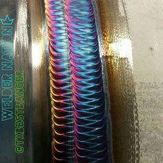 an image of colorful coils that are in the process of being made into something