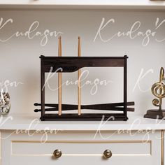 a white dresser with musical instruments on it