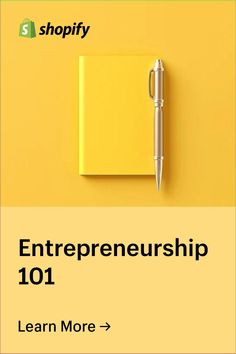 a yellow notebook with a pen sitting on top of it next to the words, shopify