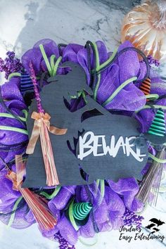 a wreath with the word beware written on it