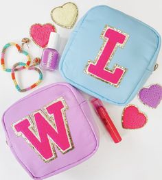 Keep your small items organized with our cheeky Letter Patch Pouch! Whether you're carrying cash or your stash of snacks, this ain't no boring bag—with a stylish letter patch on the front, you'll have the perfect piece to show off your personality :) Dimensions: 4.5 x 4.5 x 2 Gold Accent Zipper So many personalization options! Customization options: 1 big letter, 2 smaller letters, 1 icon A Stylish Letter, United Monograms, Big Letter, Bag Patches, Stoney Clover, Big Letters, Stylish Letters, Animals Funny, Small Letters