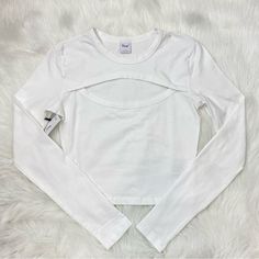 Aritzia Tnachill White Costa Longsleeve. Has A Cut Out On The Chest And A Semi Cropped Fit. Labeled A Size Small. White Fitted Long Sleeve Top For Summer, Fitted White Long Sleeve Top For Summer, White Crew Neck Crop Top For Layering, Trendy White Long Sleeve Top For Layering, White Long Sleeve Crop Top For Spring, Fitted White Long Sleeve Top, Trendy White Long Sleeve Crew Neck Top, Fitted White Cotton Long Sleeve Top, White Fitted Cotton Long Sleeve Top