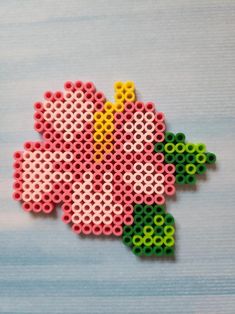 a flower made out of perler beads