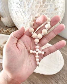 Large Rosary: Wooden beads Fresh Water Pearls Measures 15.5in Small Rosary: Wooden Beads Fresh Water Pearls Measures 4.5in White Wooden Beads Rosary As Gift, White Rosary With Wooden Beads As Gift, White Beaded Rosary With Round Beads, White Beaded Bracelets With Wooden Beads For Jewelry Making, Cream Beaded Necklaces With Large Beads For Gift, Pearl White Beads For Gifts, Small Rosary, Newborn Room, Pearl Rosary