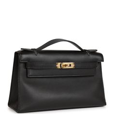 This Kelly Pochette is in black swift leather with gold hardware and has tonal stitching, front flap, two straps with center toggle closure and a top flat handle.The interior is lined with black leather and has an open wall pocket.Collection: COrigin: FranceCondition: Never worn (plastic on hardware) Accompanied by: Hermes box, Hermes dustbag, felt, carebook and ribbonMeasurements: 8.5' width x 5' height x 2.5' depth; 1' top handle Hermes Kelly 28 Black, Mini Kelly Hermes Black, Hermes Kelly Bag Black, Hermes Kelly To Go Wallet, Sneakers Street, Hermes Black Small With Shiny Cocrodile, Hermes Box, Lv Handbags, Lv Bag